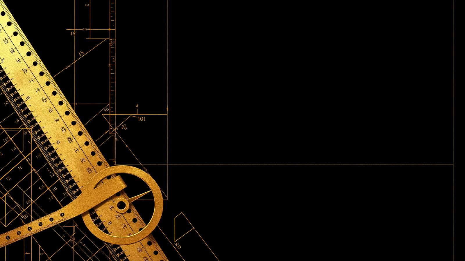 Gold blueprint and architectural tools on black background